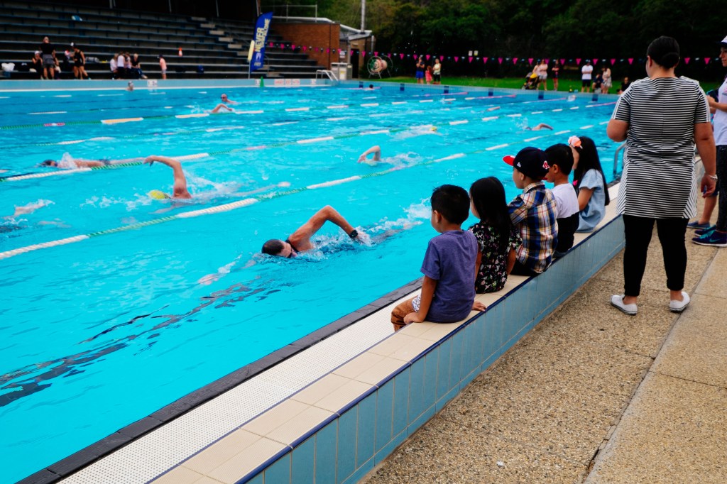 This group of kids cheered Craig's every lap.