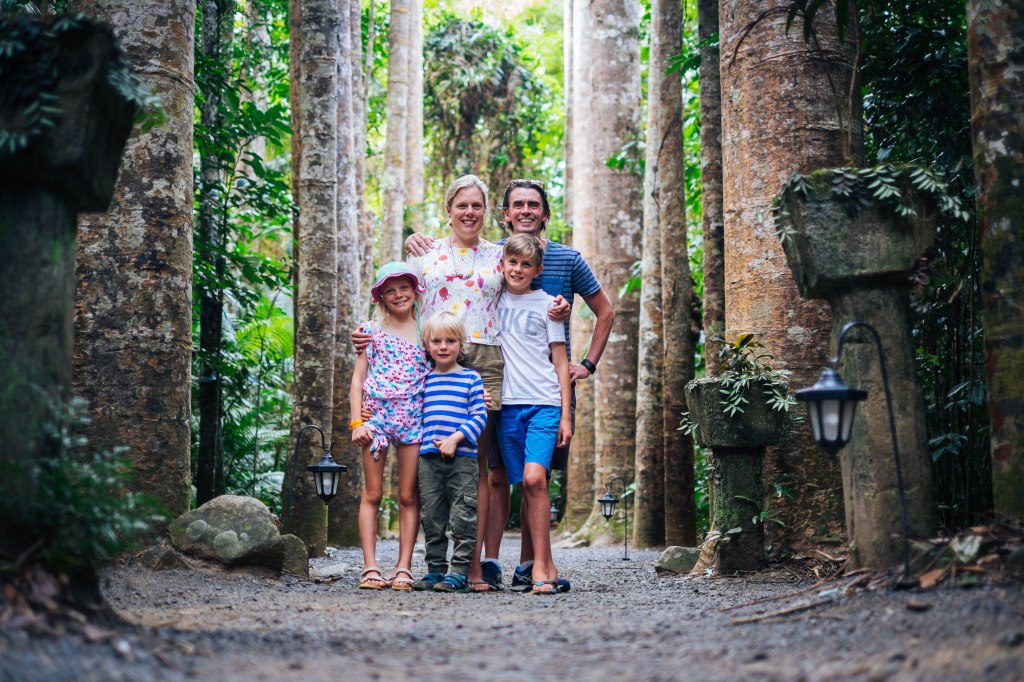 Family photo among the Kauri Pines at Paronella Park